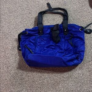 Lululemon blue tote bag with drawstrings on the side